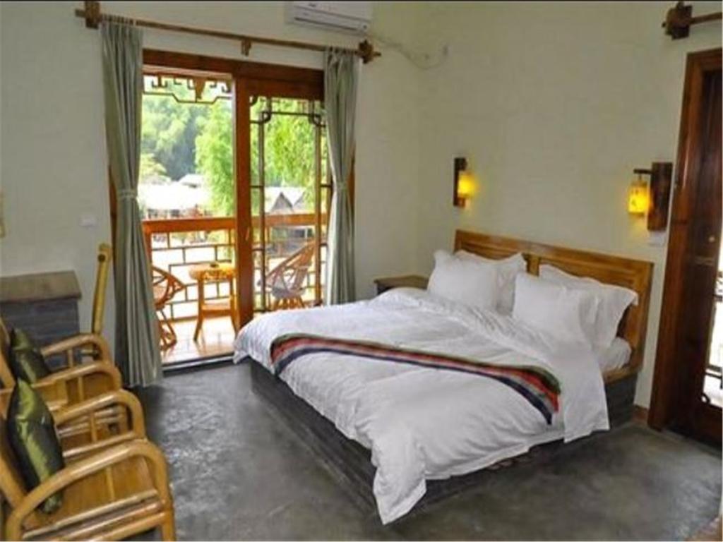 Yangshuo Phoenix Pagoda Fonglou Retreat Bagian luar foto